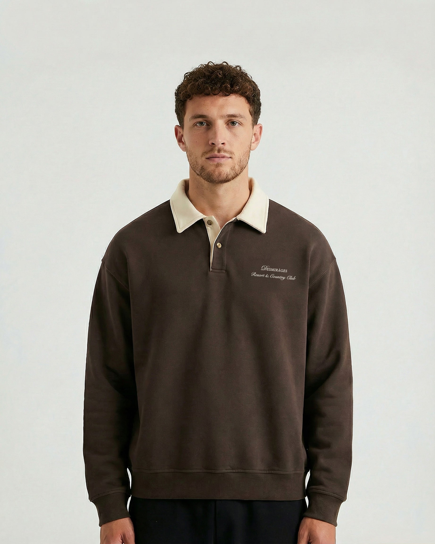 Model wearing a dark brown polo sweater