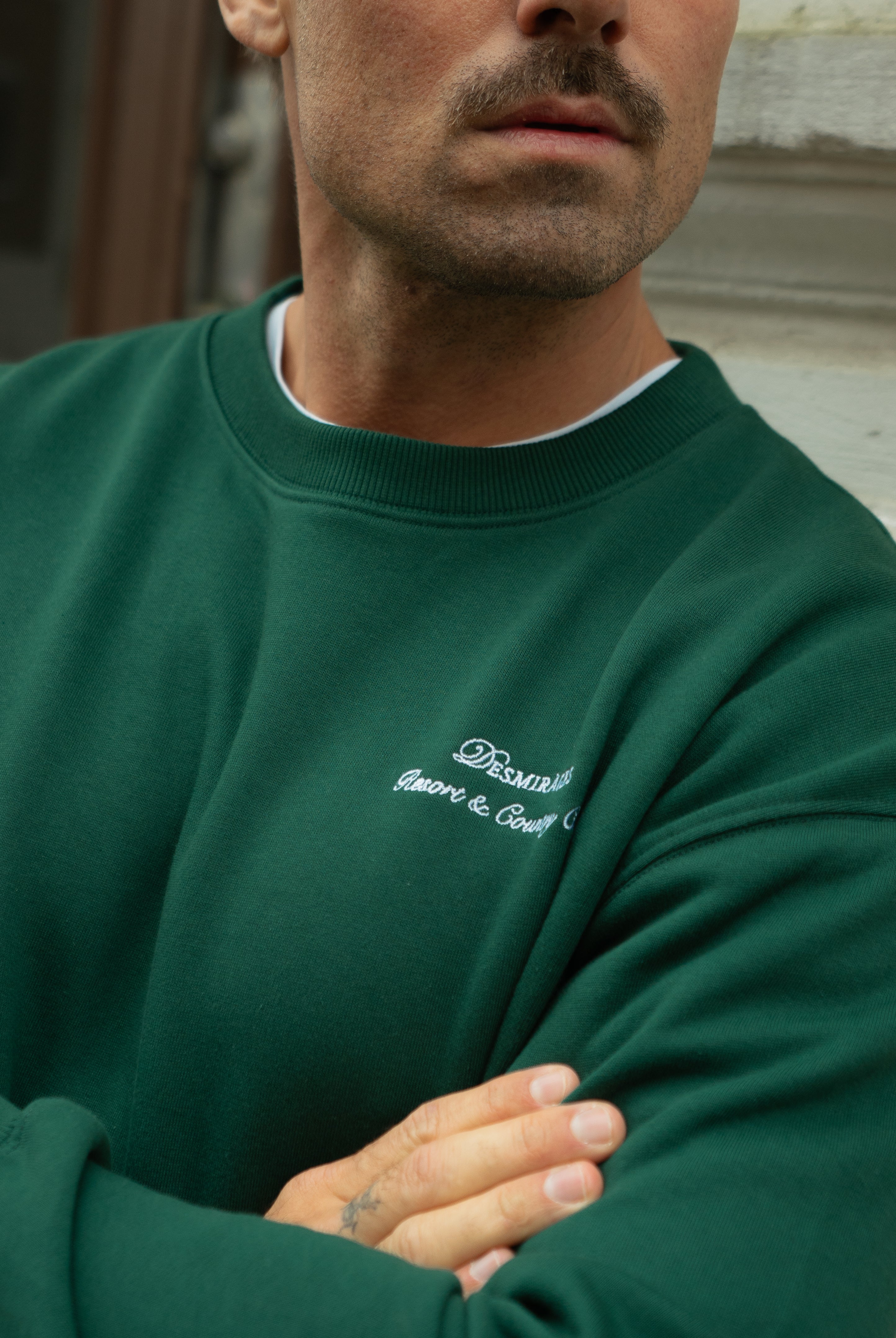 Sweater with embroidered logo