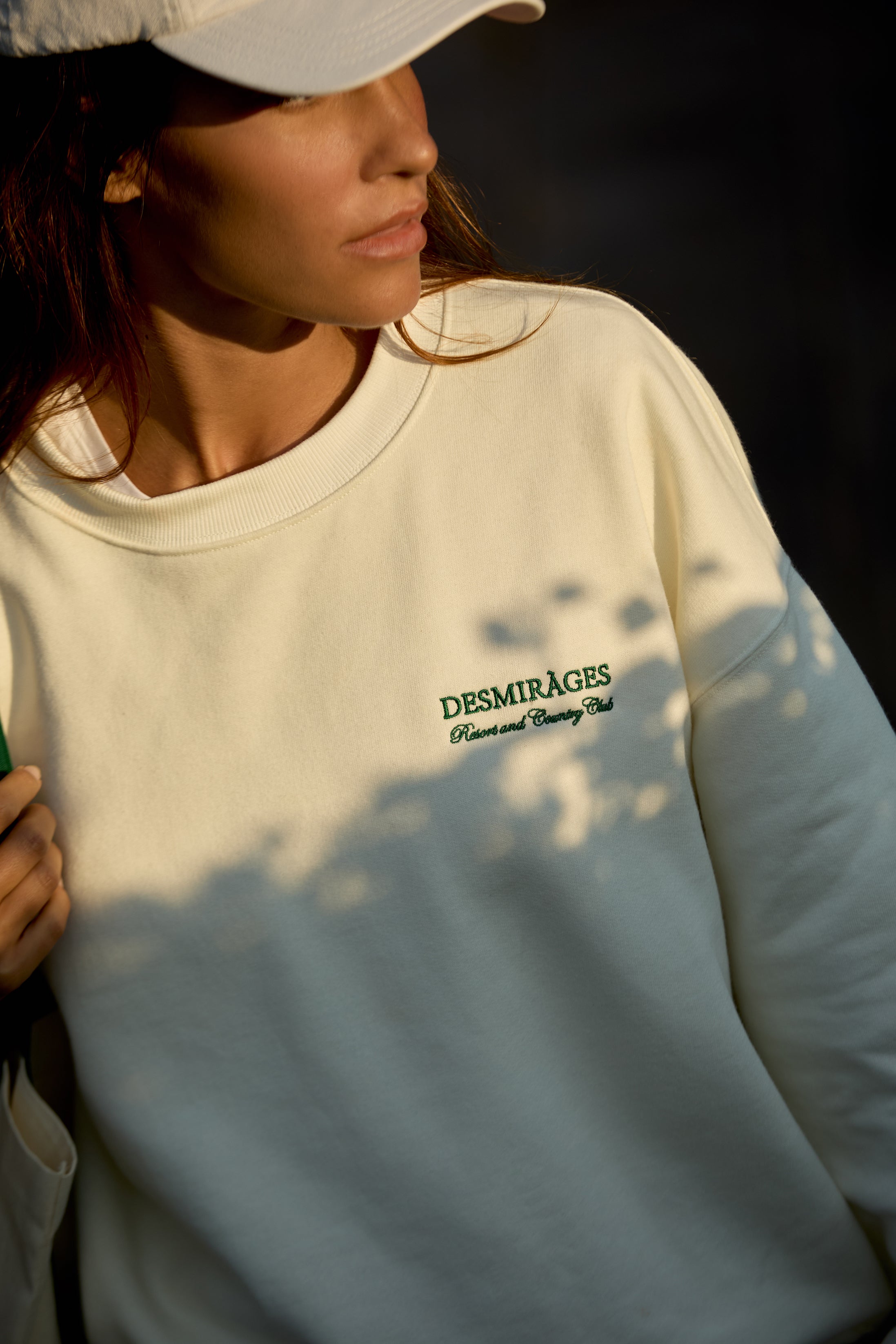 embroidered cream sweater